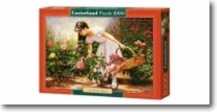 Okładka książki Puzzle 1000 Dziewczynka w ogrodzie różanym CASTOR