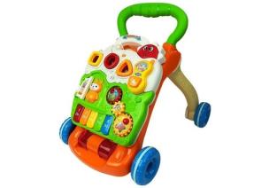Pchacz edukacyjny z pianinkiem pomarańczowo-zielony. Wydawca: Lean Toys. Multiszop.pl Opakowanie Pchacz edukacyjny z pianinkiem pomarańczowo-zielony