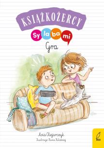 Książkożercy. Sylabami. Gra. Autor: Opracowanie zbiorowe. Multiszop.pl Okładka książki Książkożercy. Sylabami. Gra