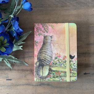 Opakowanie Notatnik z gumką A6 SCN25 Kot na płocie