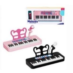Opakowanie Pianinko muzyczne z mikrofonem 55x7,6x24,3cm MIX