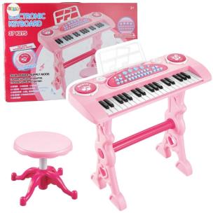 Pianinko z mikrofonem różowe. Wydawca: Leantoys. Multiszop.pl Opakowanie Pianinko z mikrofonem różowe