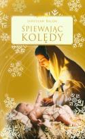 Okładka książki Śpiewając kolędy