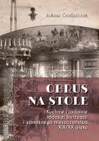 Okładka książki Obrus na stole. Kuchnie i jadalnie łódzkiej burżuazji i zamożnego mieszczaństwa XIX/XX wieku